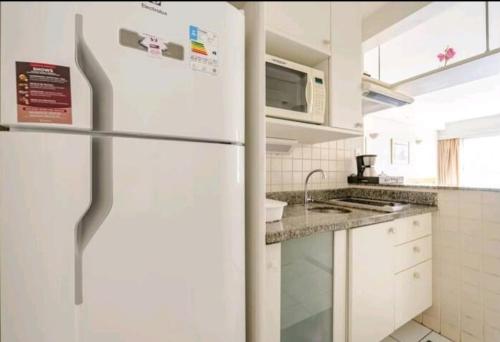 Una cocina o kitchenette en Flat in Allianz Parque com estacionamento