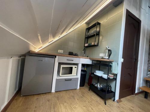 Dapur atau dapur kecil di Poilsiavietė Vita
