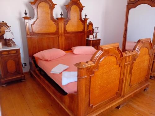 Ένα ή περισσότερα κρεβάτια σε δωμάτιο στο Su Mulinu