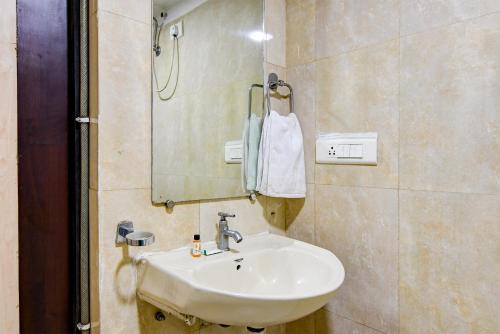 Koupelna v ubytování Hotel Q Inn