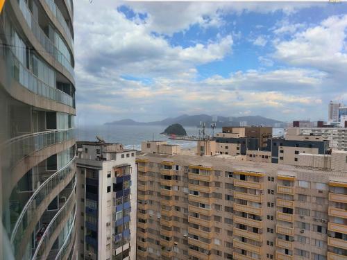 a view of the ocean from a building at Book Santos - Unlimited 1608 Panorâmico c/ 3 dorm in Santos