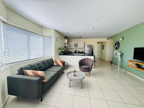 Una cocina o zona de cocina en # Blue Bay Beach - Ocean View Apartments - FULLY AIR CONDITIONED #