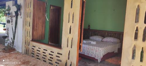 Un pat sau paturi într-o cameră la Eco Hostel Lunar