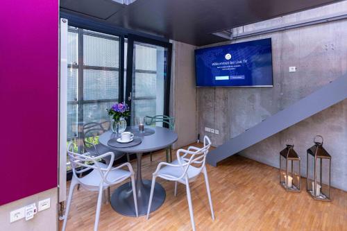 Μια τηλεόραση ή/και κέντρο ψυχαγωγίας στο Fancy Loft mit Traumblick