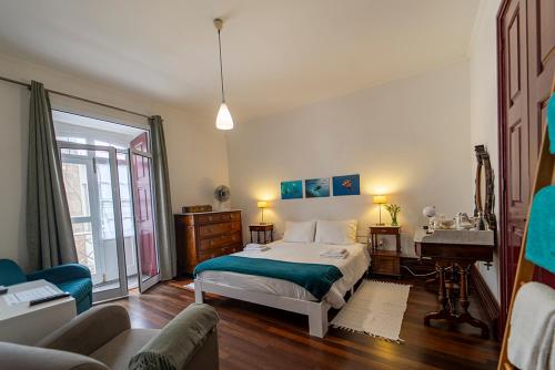 Postel nebo postele na pokoji v ubytování Alojamento do Arco