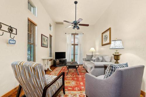 a living room with two chairs and a couch at #24 at Gruene Silo Inn in New Braunfels