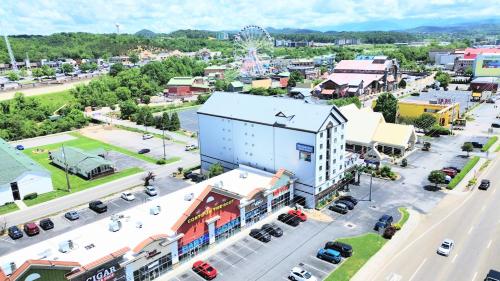 an aerial view of a city with a street at Mountain Vista Inn & Suites - Walking Distance to the Island in Pigeon Forge