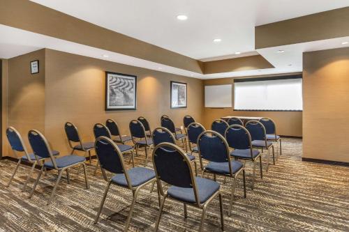 a conference room with chairs and a projection screen at Best Western Plus Wine Country Inn & Suites in Santa Rosa