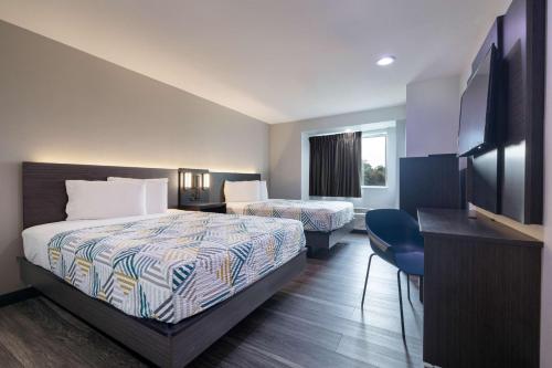 Postel nebo postele na pokoji v ubytování Motel 6-McAllen, TX - East