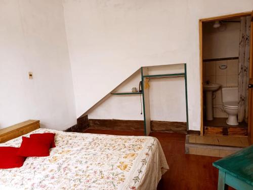 Ένα ή περισσότερα κρεβάτια σε δωμάτιο στο Rinconcito Andino