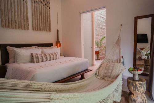 Cama o camas de una habitación en Olbil Hotel Boutique