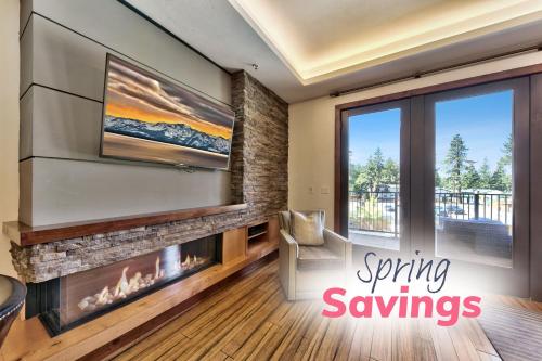 a living room with a fireplace and a tv at Zalanta 220 - Heavenly Wow-Pool View in Stateline