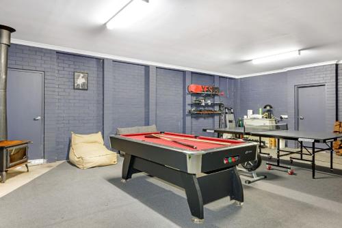 a ping pong room with two ping pong tables at Merrivale Hill, Merrijig - Sleeps 10 in Merrijig