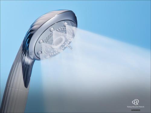 a close up of a toaster with steam coming out at Daiwa Roynet Hotel Chiba Ekimae in Chiba