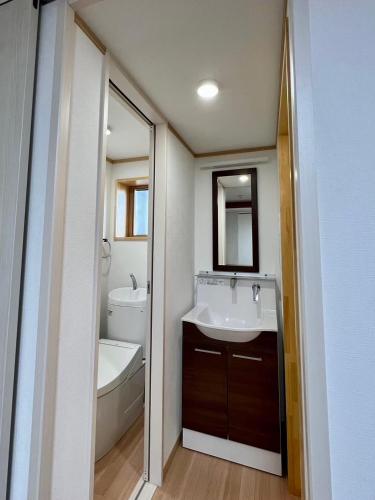 Koupelna v ubytování James House