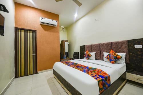 a bedroom with a large bed in a room at Via Galaxy in Chandīgarh