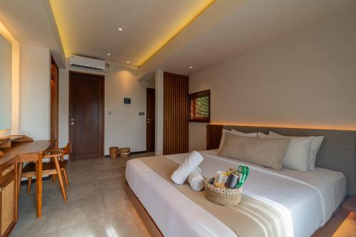 Ένα ή περισσότερα κρεβάτια σε δωμάτιο στο Ubud Aura Wellness Sanctuary