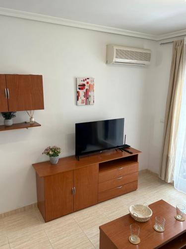 TV/trung tâm giải trí tại Apartamento Costa Caribe - Magic World - Oropesa del mar