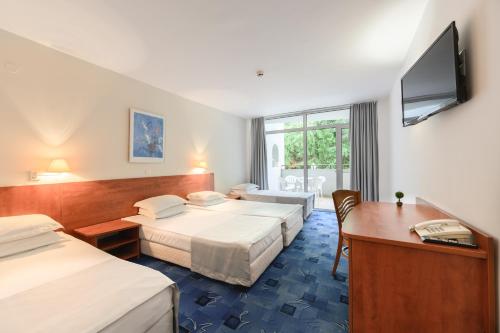 Letto o letti in una camera di Madara Park Hotel - All Inclusive or BB