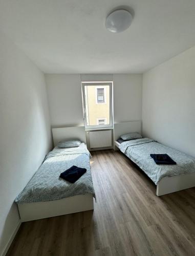Katil atau katil-katil dalam bilik di Gemütliches Zimmer in Rheinnähe