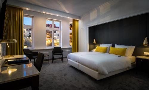 Postel nebo postele na pokoji v ubytování Van der Valk Hotel Hildesheim