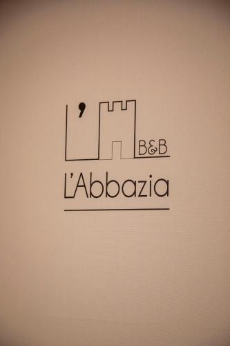 B&B L'ABBAZIAに飾ってある許可証、賞状、看板またはその他の書類