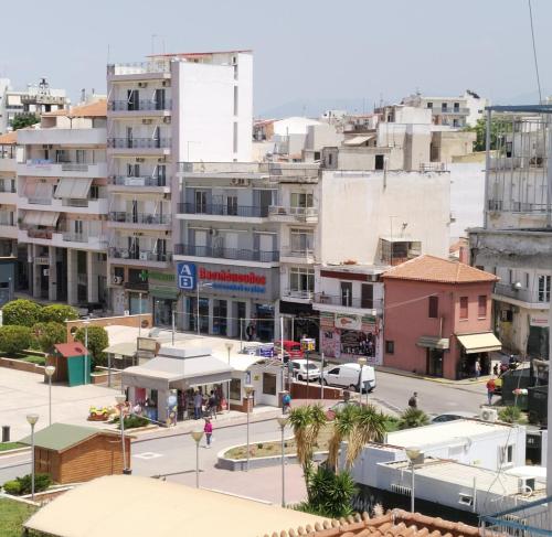 a view of a city with tall buildings at IRENE΄S DOWNTOWN APARTMENT in Chalkida