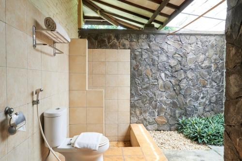 Koupelna v ubytování Horison Resort Tlogo Semarang