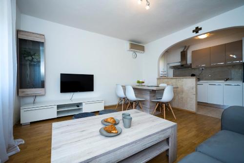 Η κουζίνα ή μικρή κουζίνα στο M&M Pelivan apartments