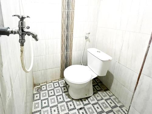 Ванная комната в Rumah Bromo RedPartner