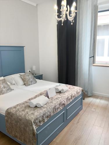 Postel nebo postele na pokoji v ubytování Centrum Luxury Rooms