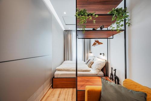Una cama o camas en una habitación de TheWICKI 22 - Wunderschöne Apartments in Wien