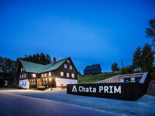a chateau run sign in front of a building at Chata Prim in Deštné v Orlických horách