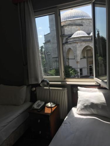 Postel nebo postele na pokoji v ubytování No20 Hotel Sultanahmet