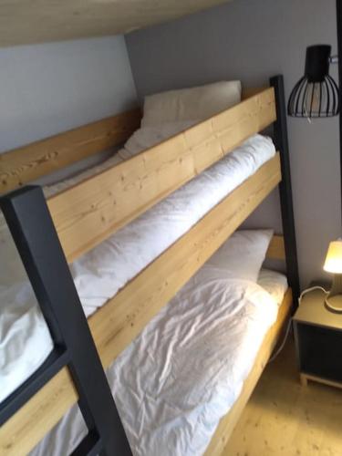 quelques lits superposés dans une chambre dans l'établissement 2 ALPES, appart 60m2 déco tendance, à Les Deux Alpes
