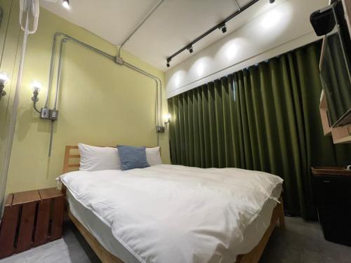 Una cama o camas en una habitación de 理想家