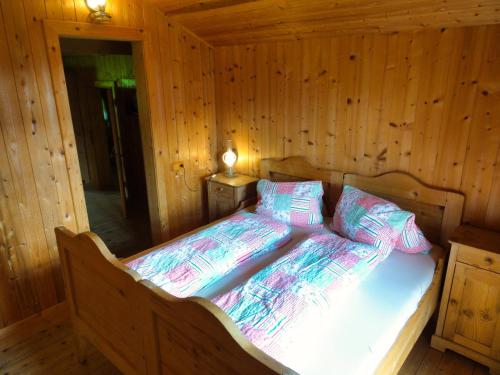 Una cama o camas en una habitación de Bergquellenhütte