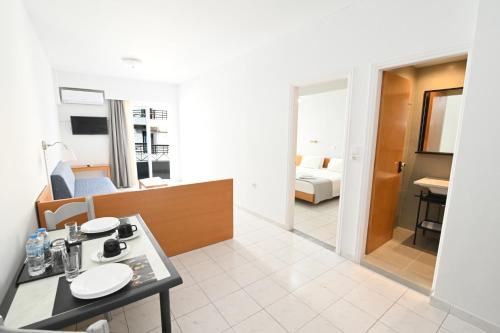Kuchyň nebo kuchyňský kout v ubytování Jasmine Hotel Apartments