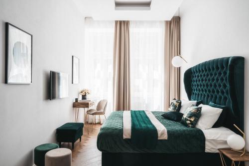 Posteľ alebo postele v izbe v ubytovaní House of Loft Affair