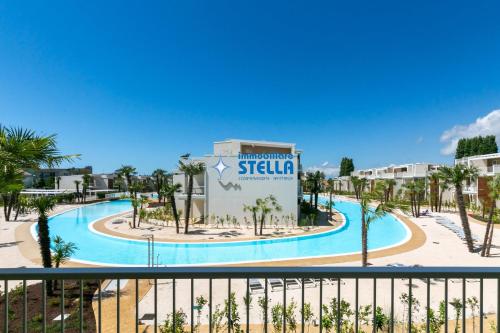 a view of a swimming pool at a resort at Wave Island in Lido di Jesolo