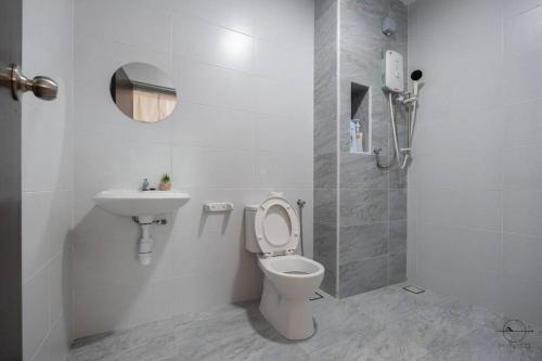 a white bathroom with a toilet and a sink at [Cats Design Studio] #Level 27 #Austin #New condo in Johor Bahru