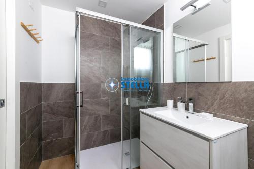 a bathroom with a shower and a sink at Wave Island in Lido di Jesolo