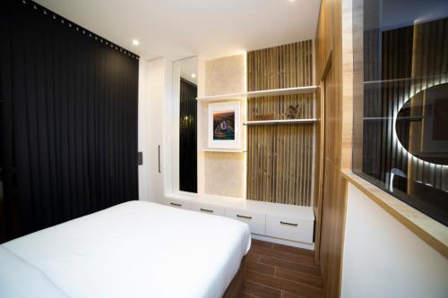 Letto o letti in una camera di Fabulosa vivienda nueva a un paso de Plaza EspañA