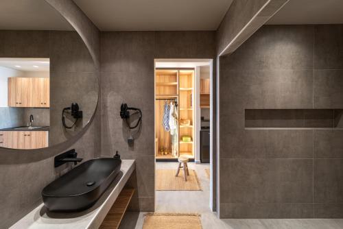 Koupelna v ubytování Afesou Suites
