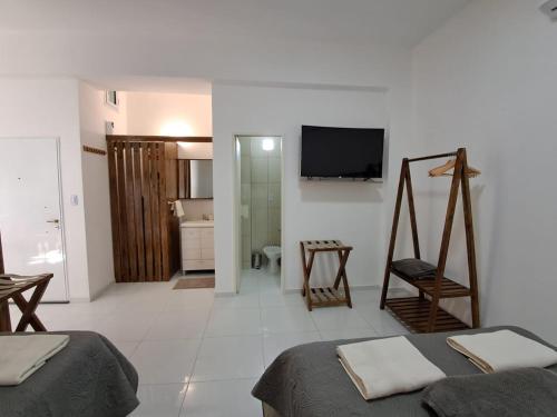 TV a/nebo společenská místnost v ubytování Departamento Rivadavia