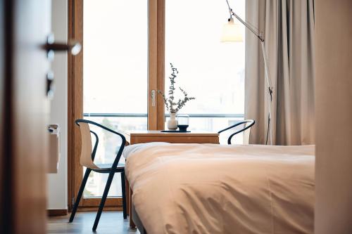 Cama o camas de una habitación en Hotel Haus am Meer