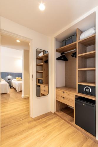 Cama ou camas em um quarto em Hotel Anabel