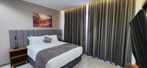 Katil atau katil-katil dalam bilik di Oryx Boutique Hotel