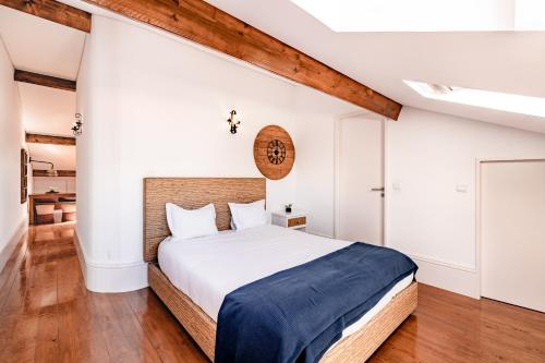 Llit o llits en una habitació de The Almada Flats