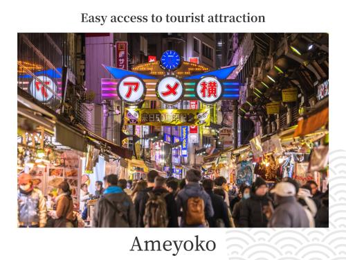 a crowd of people walking down a crowded street in a city at MIMARU Tokyo Ueno Okachimachi in Tokyo